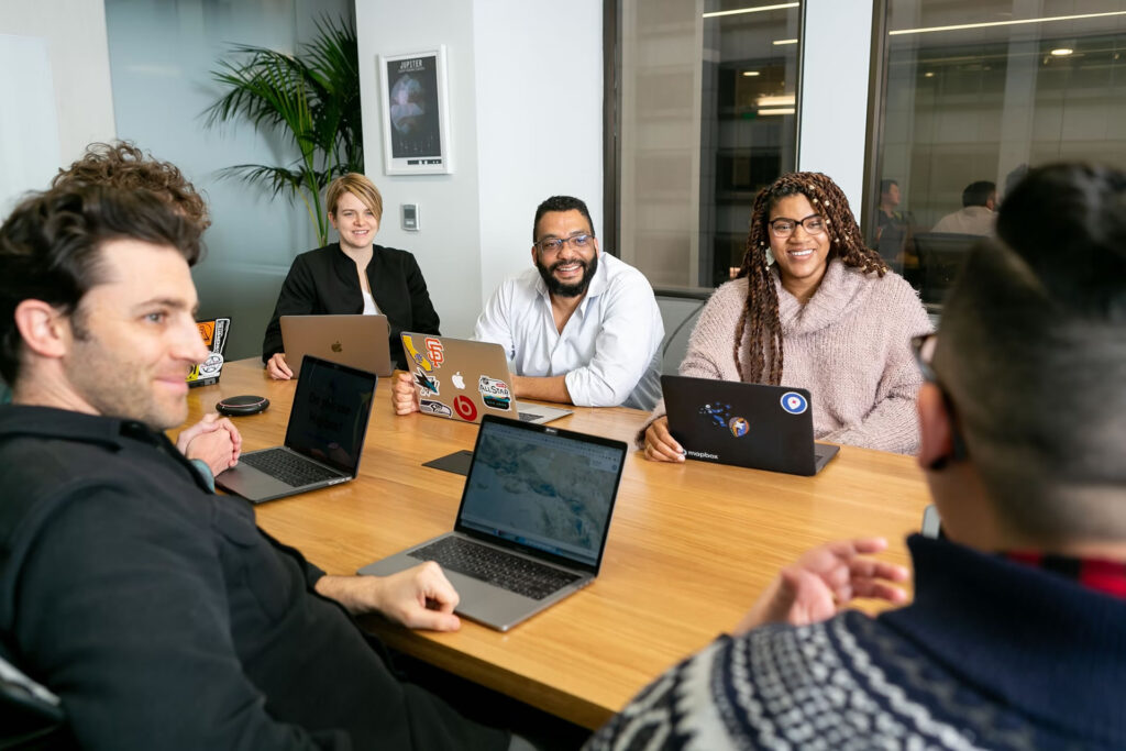 people on the table smiling